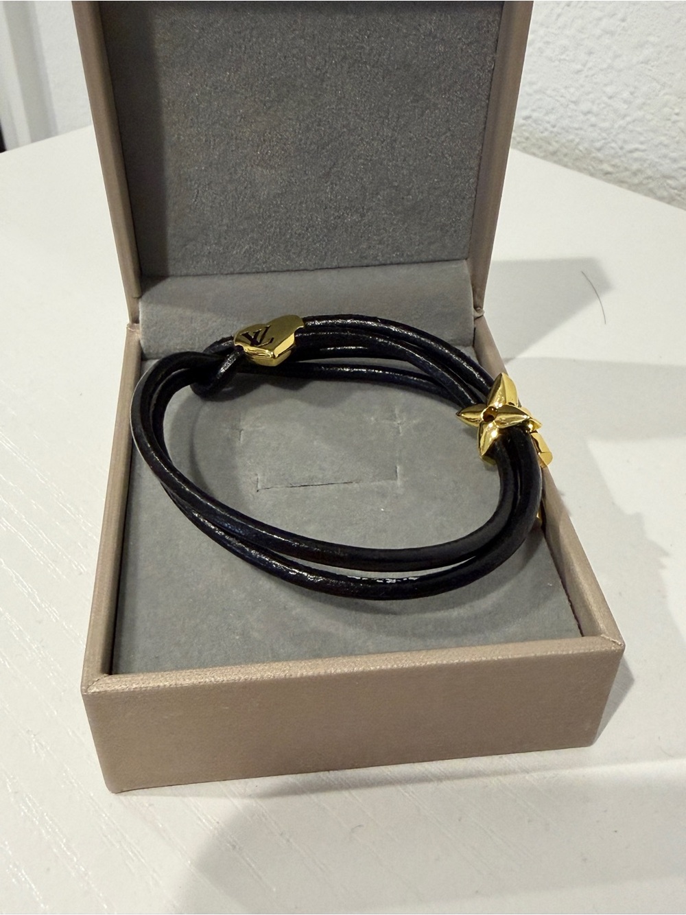 Black Leather Wrap Bracelet with Gold Star Accent